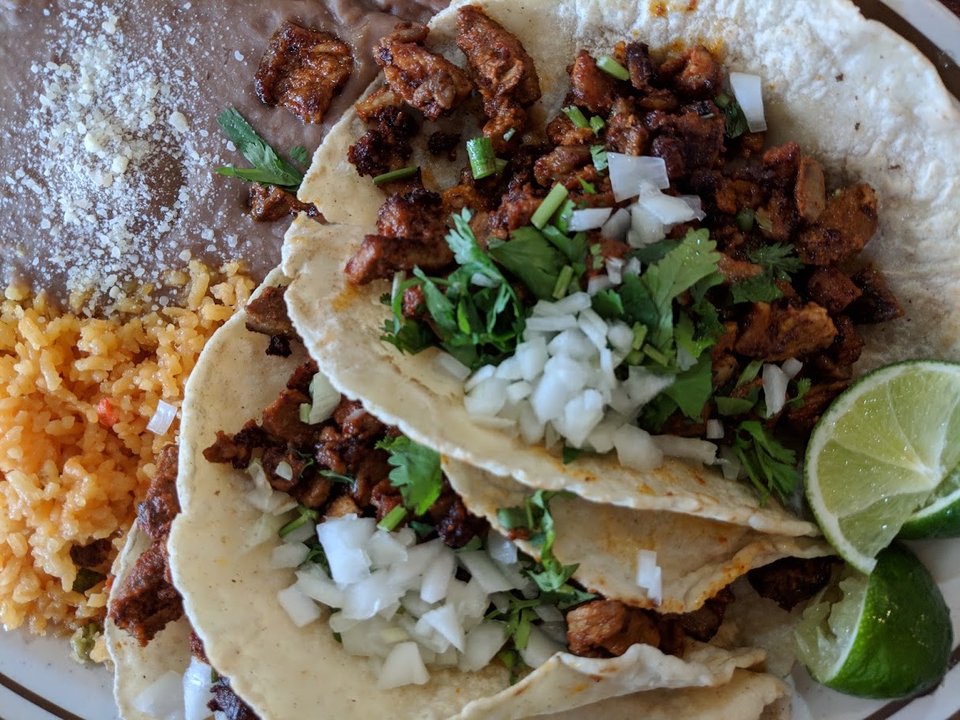 Tacos and burritos served in a straightforward setting.