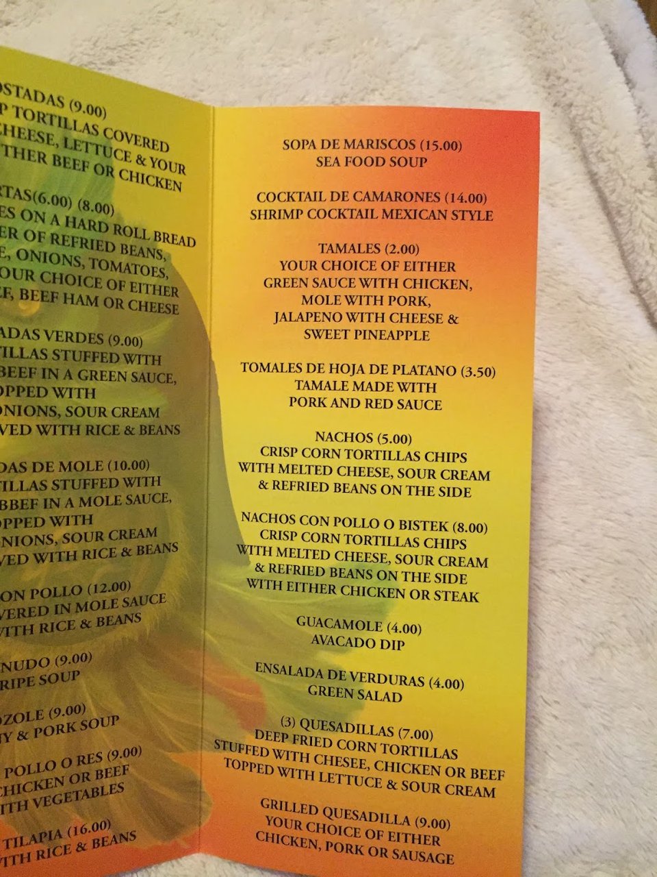 Menu page listing aguas frescas and Mexican sodas.